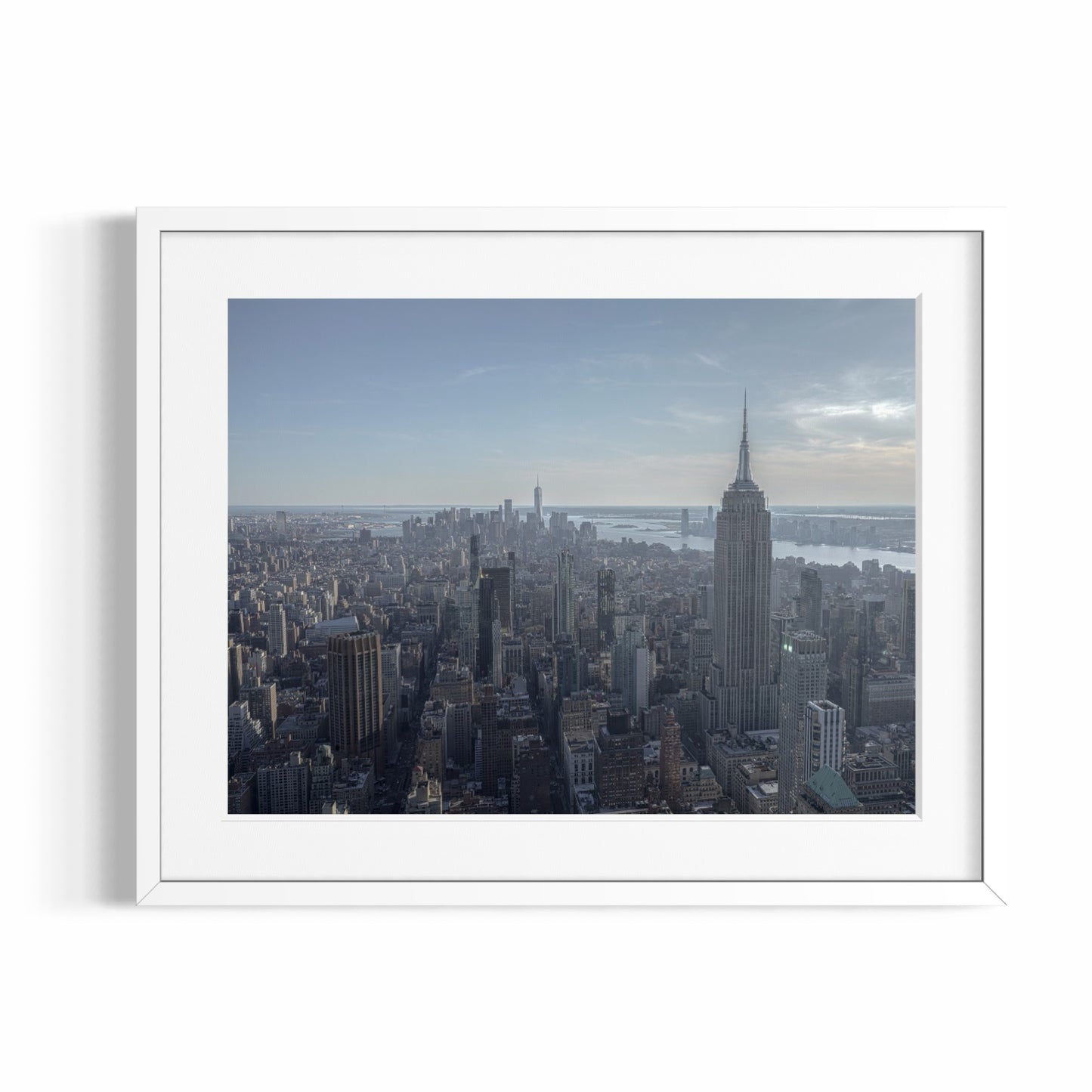 THE SUN ON MANHATTAN