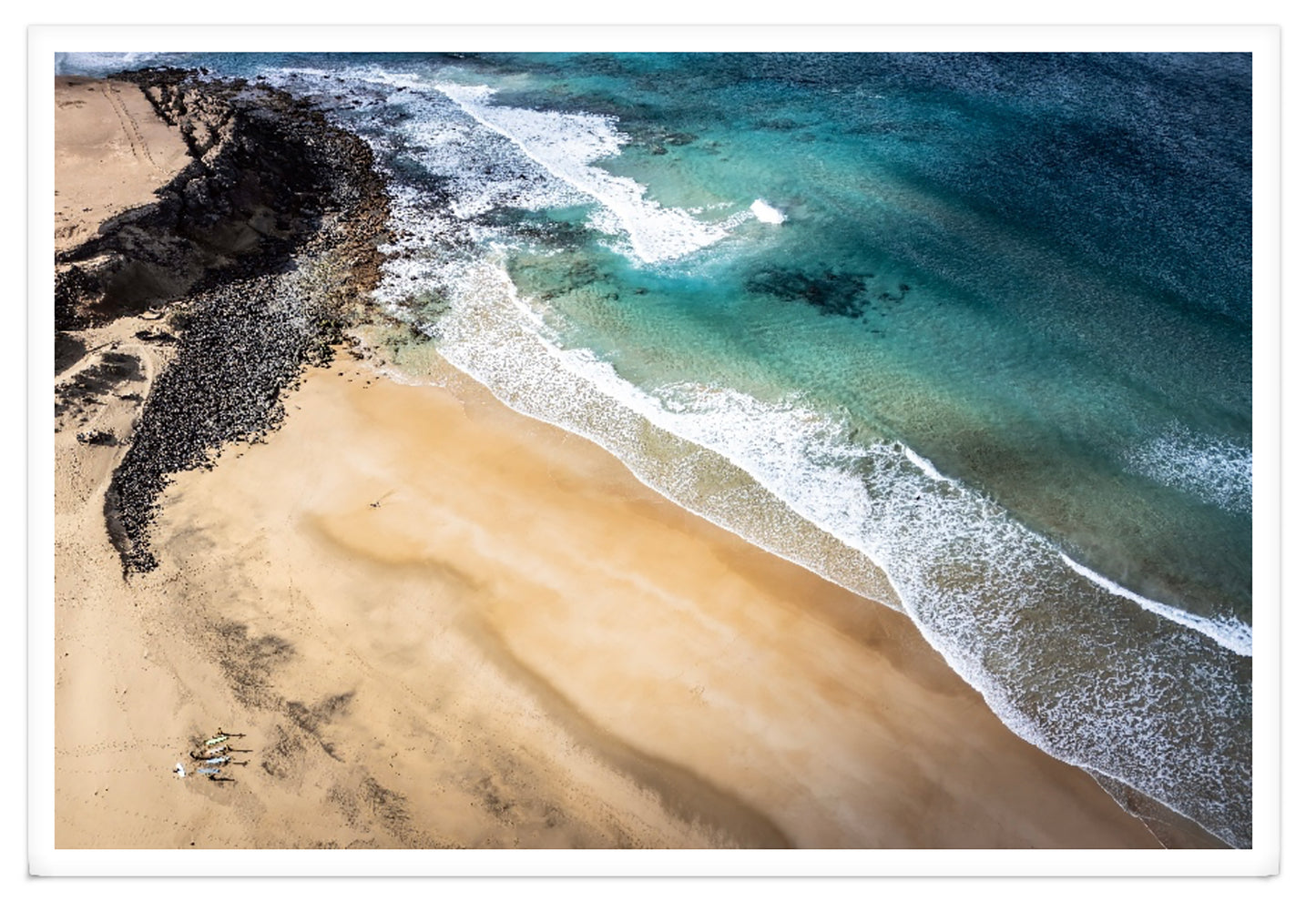 SURFERS ON THE BEACH