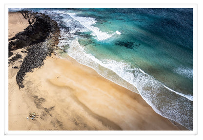 SURFERS ON THE BEACH