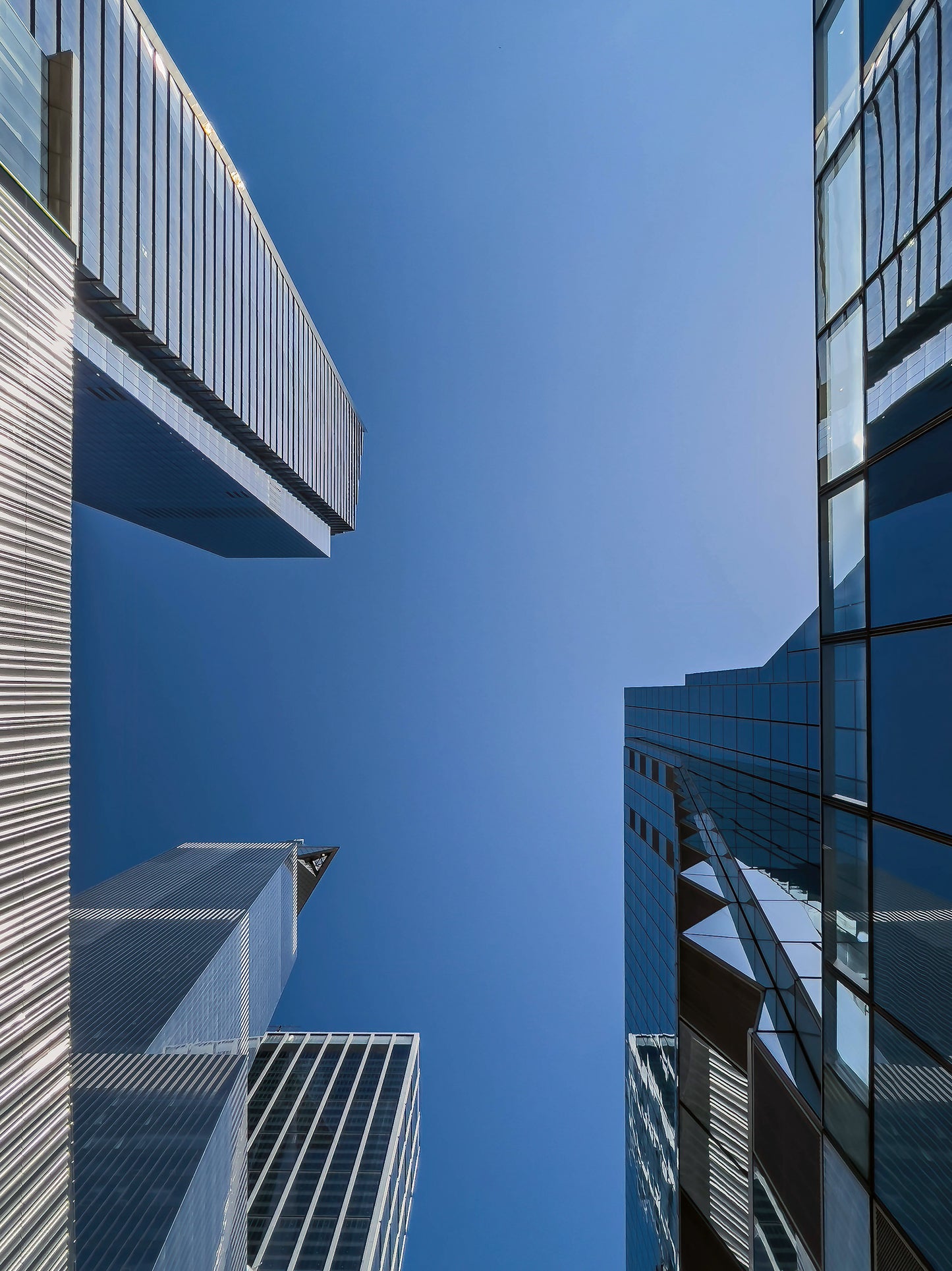 UNDER THE MODERN GIANTS